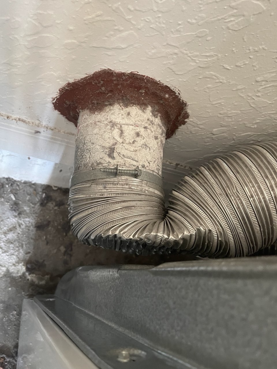 Dryer Not Drying in Coral Springs? Why a Bent Vent Might Be the Culprit