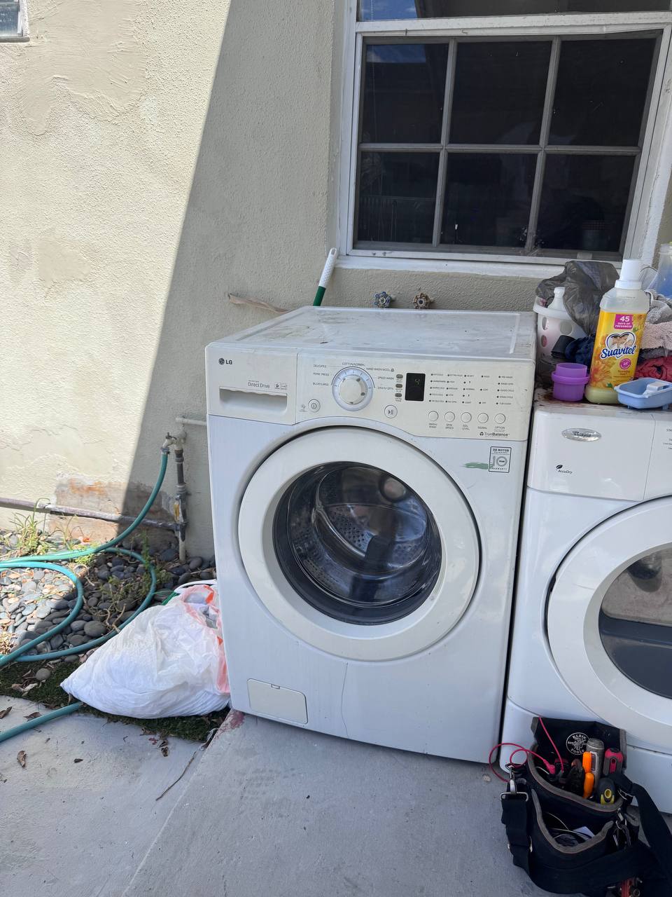 Reviving a Dead LG Washer Damaged by Rainwater in Davie — Before